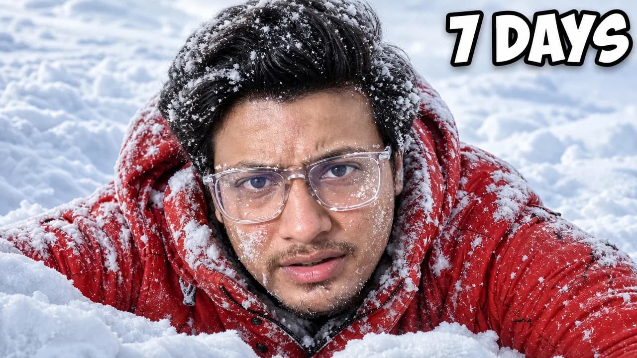 Snow-covered creator crawling through deep snow beneath 7 Days lettering